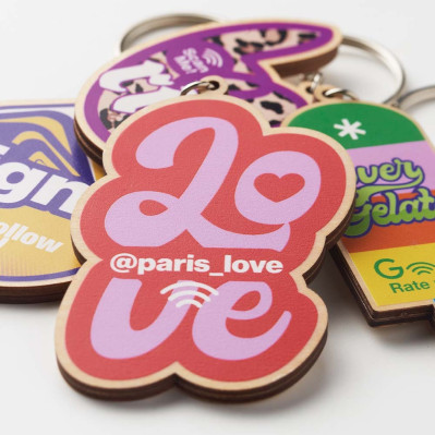 Trænøgleringe med forskellige tryk og logo